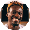 Portrait of young laughing black man with colored